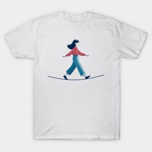 a girl walks on a tightrope T-Shirt